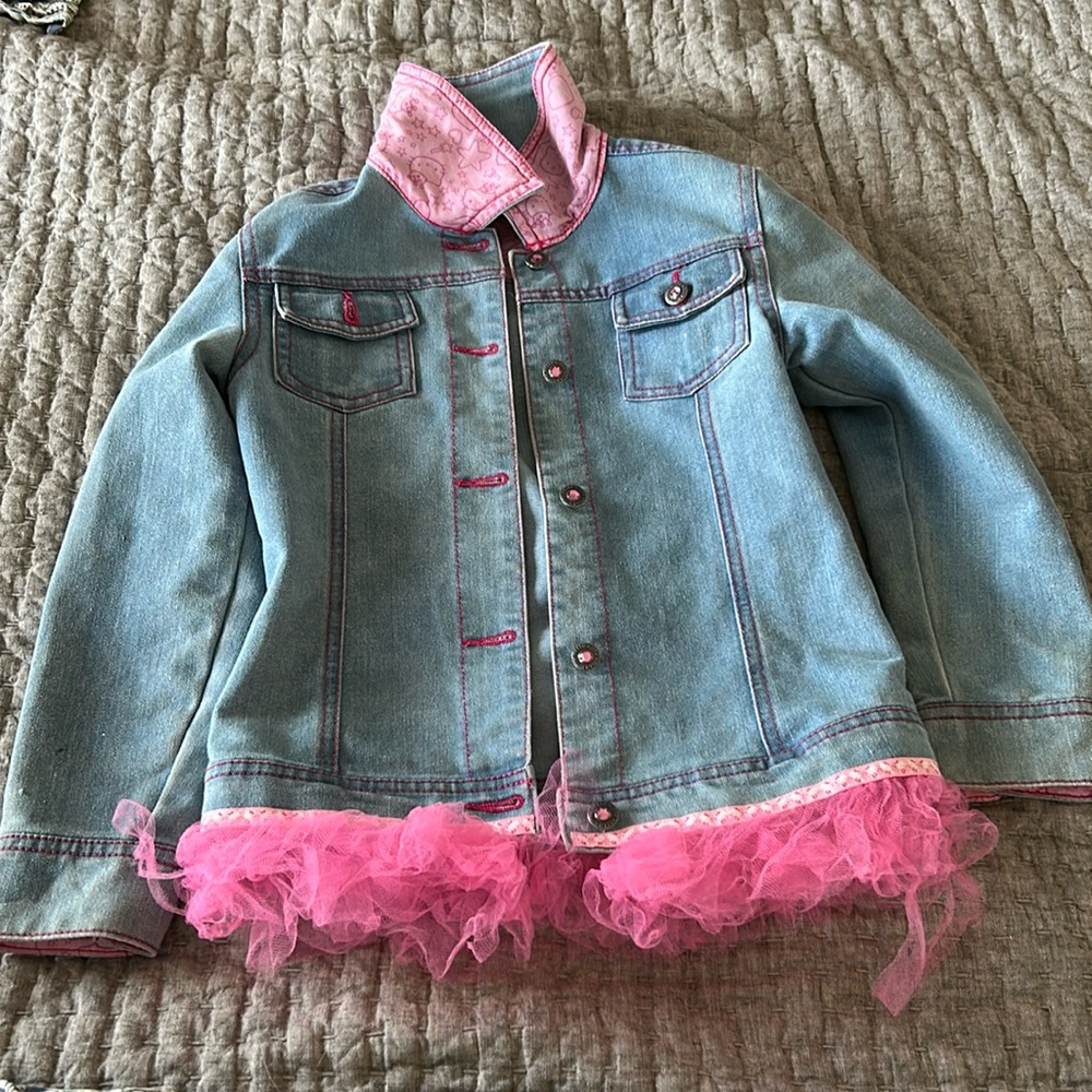 Hello Kitty jean jacket with pink frilly accents